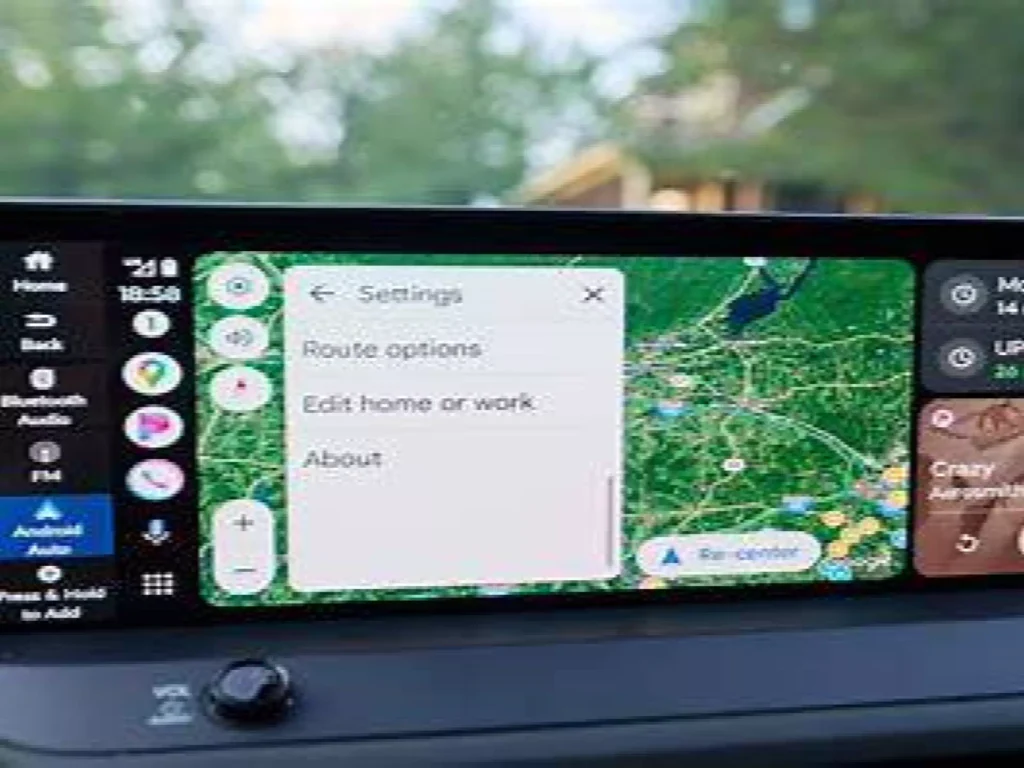 Widok interfejsu Android Auto na ekranie samochodowym – uproszczone menu i aplikacje
