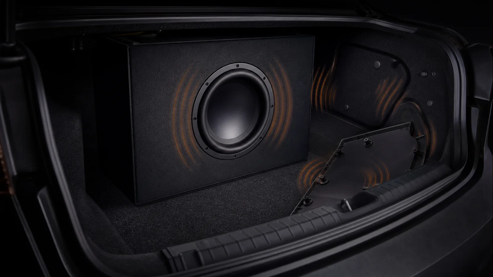 Resonating subwoofer enclosure and trunk trim